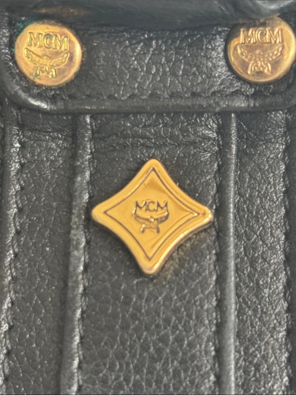 MCM Black Leather Satchel with Gold Hardware Accents